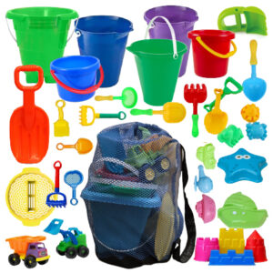 assorted beach toys: shovel, bucket, toy trucks, sand molds
